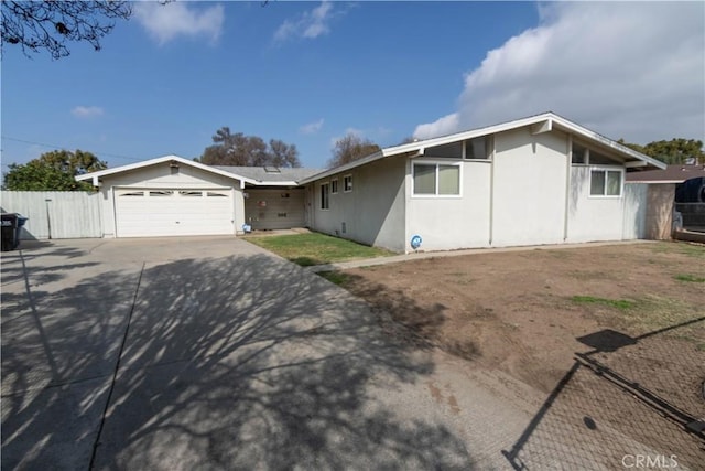 ranch-style home with a garage