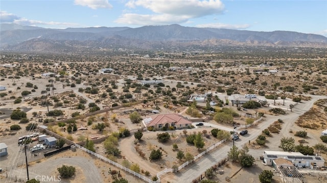 drone / aerial view featuring a mountain view