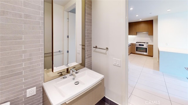 bathroom with tile patterned floors and sink