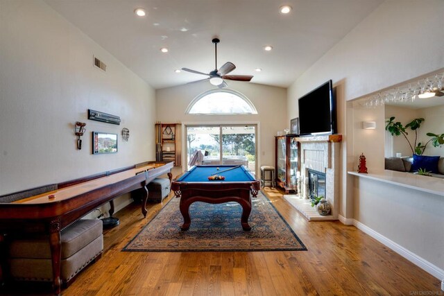 rec room with vaulted ceiling, ceiling fan, light hardwood / wood-style floors, and billiards