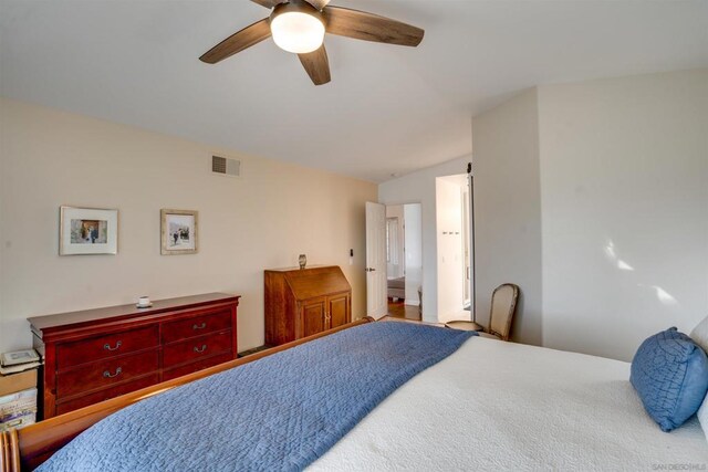 bedroom with vaulted ceiling and ceiling fan