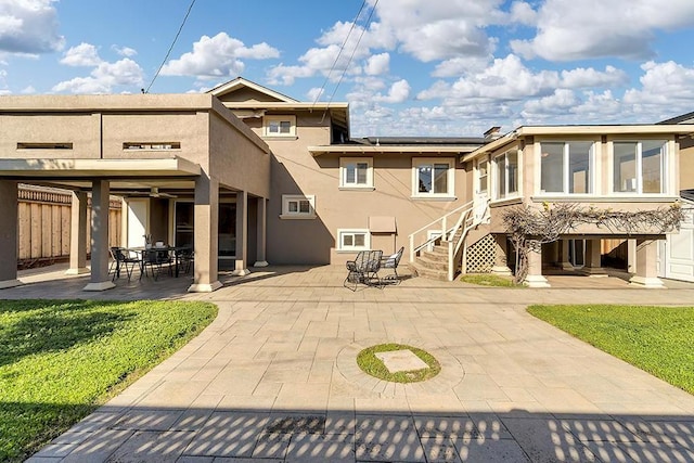 back of house featuring a patio