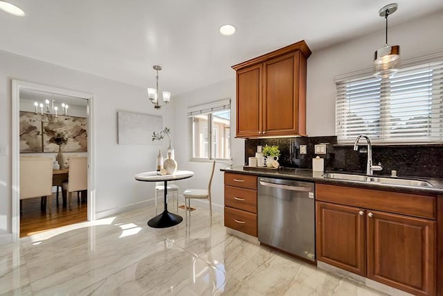 kitchen featuring pendant lighting, sink, dishwasher, a notable chandelier, and decorative backsplash