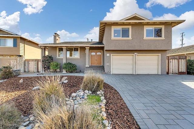 view of front of property featuring a garage