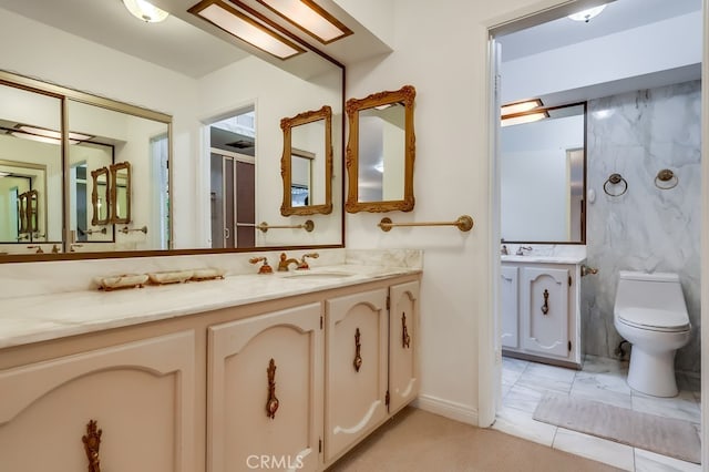 bathroom with vanity and toilet