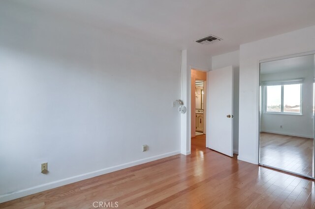 unfurnished bedroom featuring light hardwood / wood-style flooring