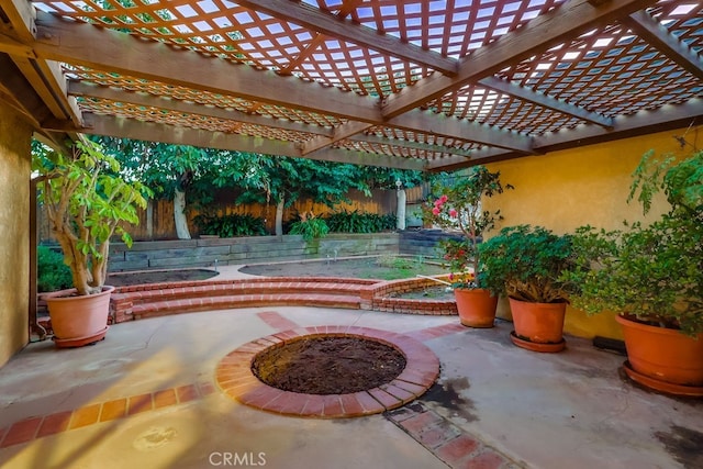 view of patio featuring a pergola