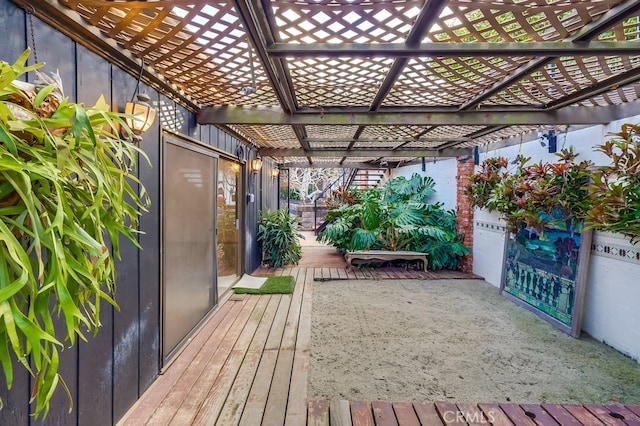 wooden deck with a pergola