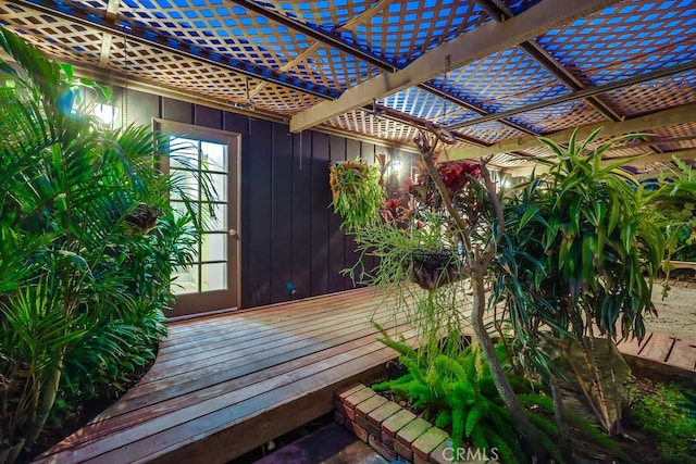 wooden deck with a pergola