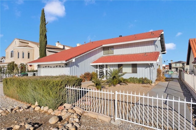 view of front of property with a garage