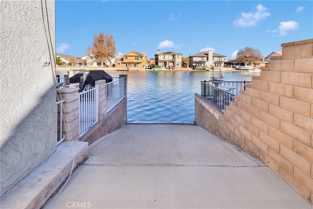 dock area with a water view