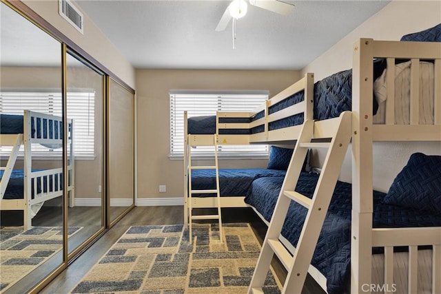 bedroom with hardwood / wood-style floors