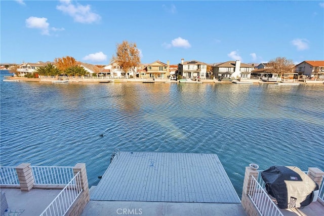 dock area featuring a water view