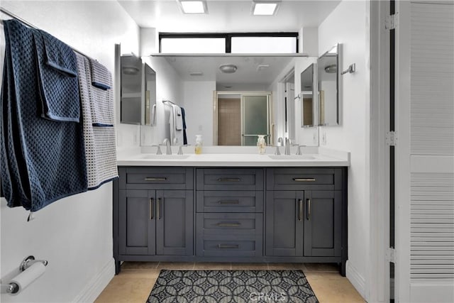 bathroom featuring vanity, tile patterned floors, and a shower with door