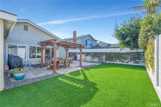 view of yard with a pergola and a patio