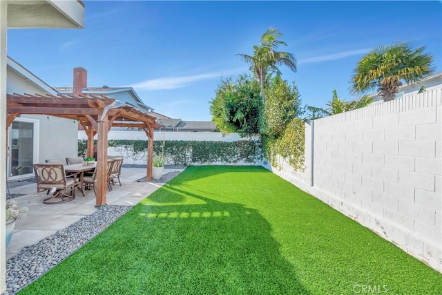 view of yard with a patio and a pergola