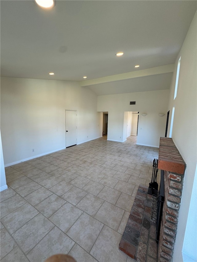 empty room with vaulted ceiling