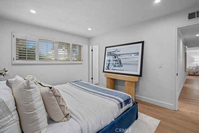 bedroom featuring light hardwood / wood-style floors