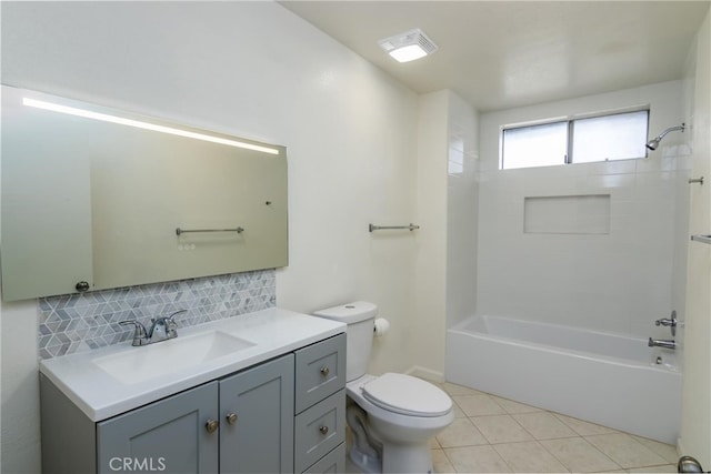 full bathroom with shower / washtub combination, decorative backsplash, vanity, toilet, and tile patterned floors