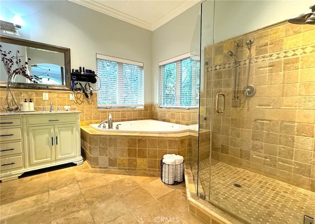 bathroom featuring vanity, crown molding, and independent shower and bath