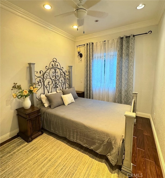 bedroom featuring crown molding and ceiling fan