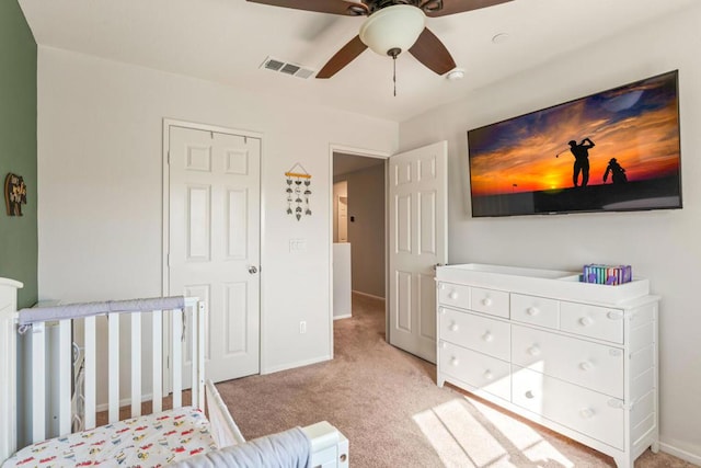 carpeted bedroom featuring ceiling fan