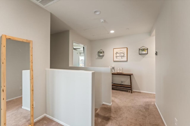 hallway with light carpet