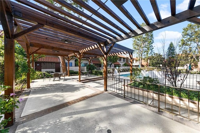 view of patio featuring a pergola