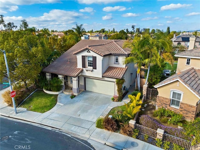 mediterranean / spanish-style house featuring a garage