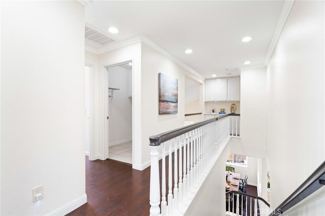 hall featuring crown molding and dark hardwood / wood-style floors