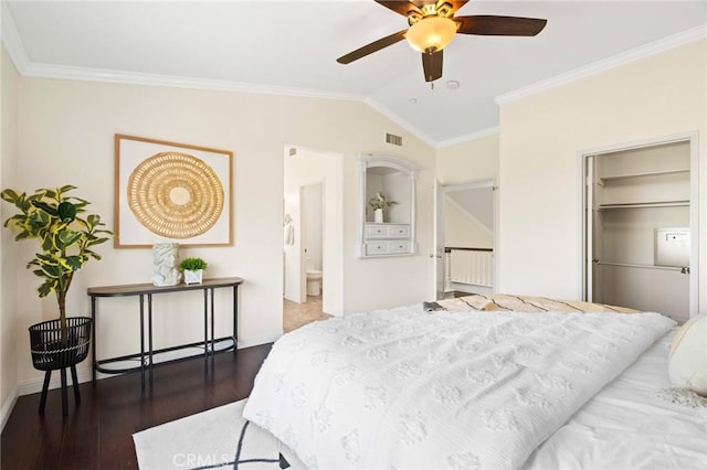 bedroom with crown molding, vaulted ceiling, and dark hardwood / wood-style floors