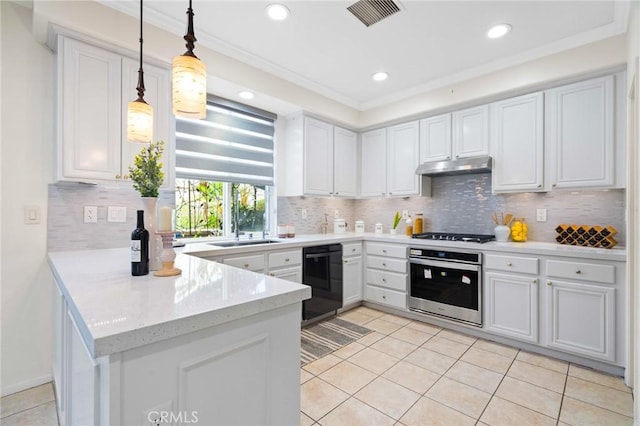 kitchen featuring white cabinetry, pendant lighting, and black appliances