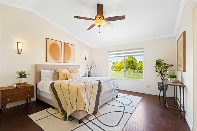 bedroom featuring dark wood-type flooring, ceiling fan, lofted ceiling, and crown molding