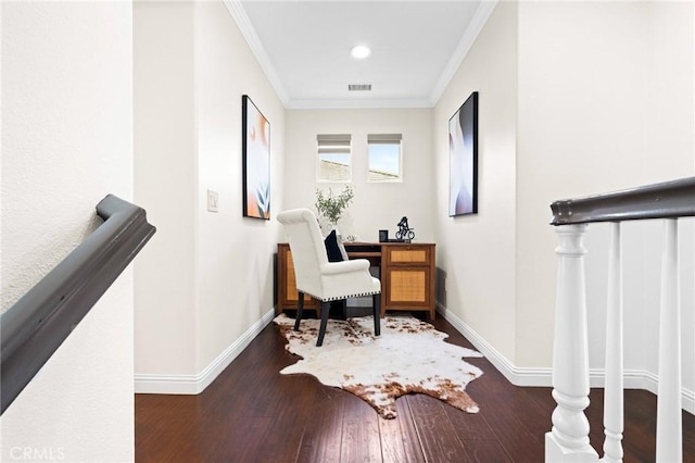 interior space with ornamental molding and dark wood-type flooring