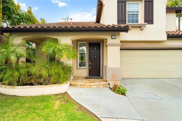 entrance to property featuring a garage