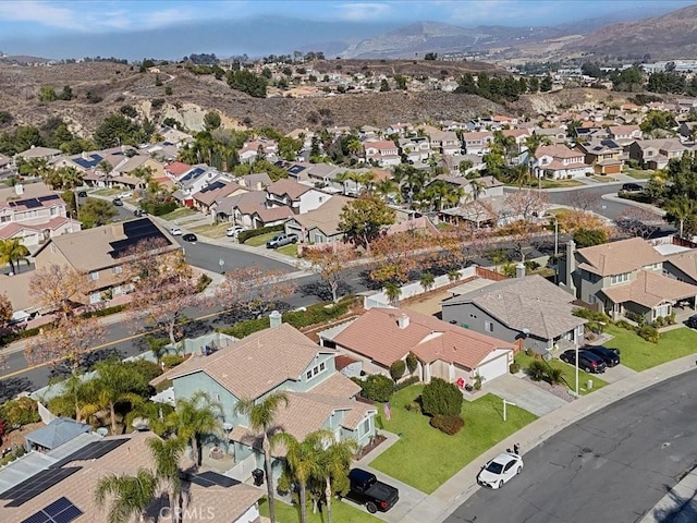 drone / aerial view with a mountain view and a residential view