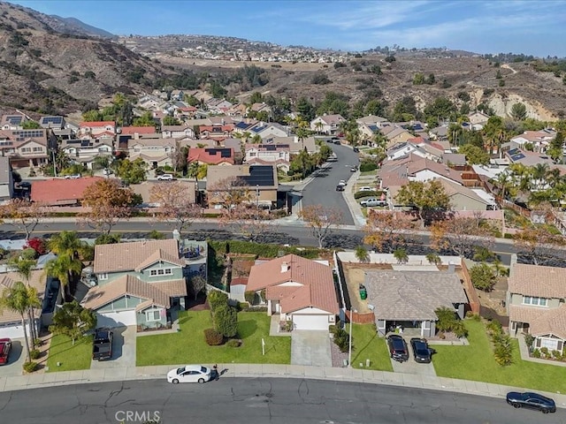 birds eye view of property featuring a residential view and a mountain view