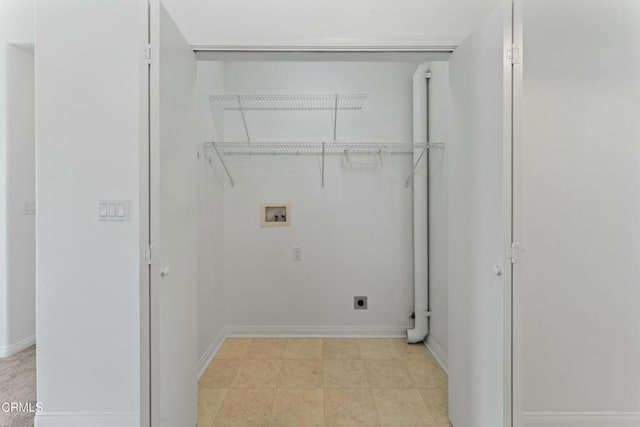 laundry room with laundry area, baseboards, washer hookup, and hookup for an electric dryer