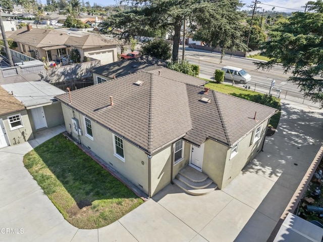 drone / aerial view with a residential view