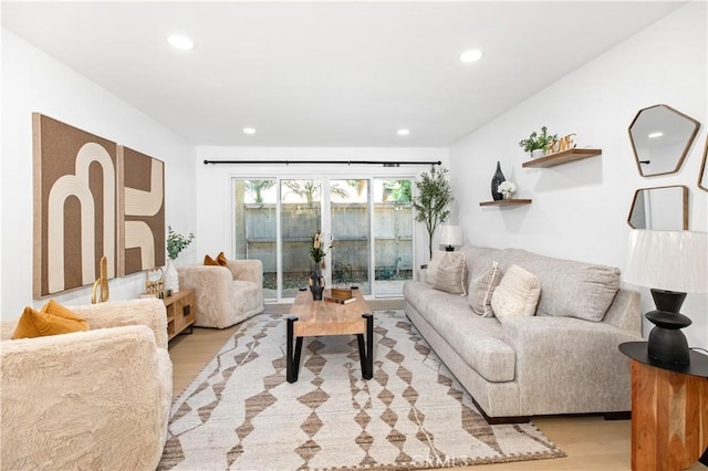 living room with light hardwood / wood-style flooring