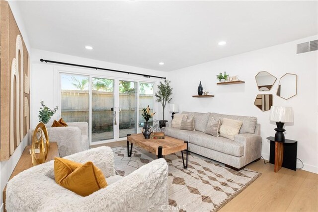 living room with light wood-type flooring