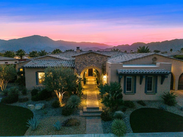 view of front facade with a mountain view