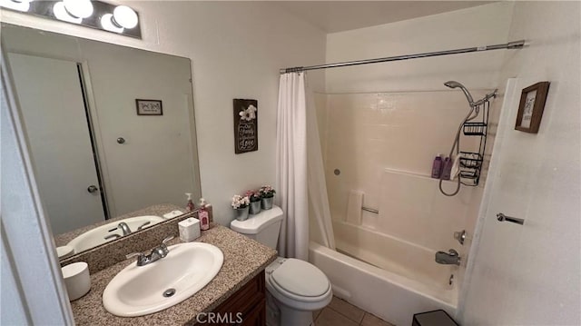 full bathroom with tile patterned flooring, vanity, toilet, and shower / bath combo with shower curtain