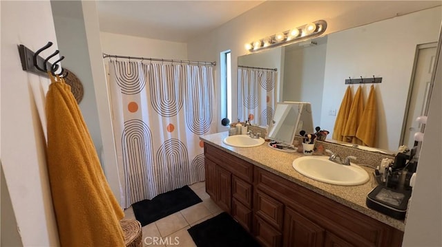 bathroom featuring tile patterned floors and vanity