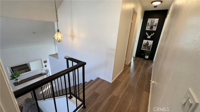 hall with dark hardwood / wood-style floors