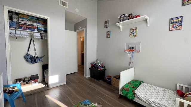 mudroom with dark wood-type flooring