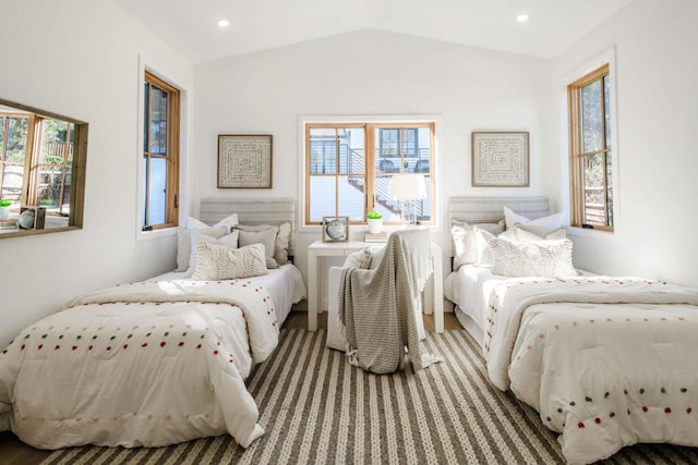 bedroom featuring lofted ceiling