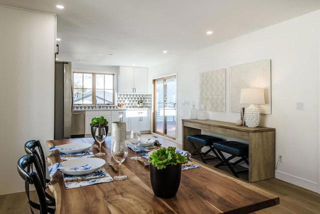 dining room featuring hardwood / wood-style flooring