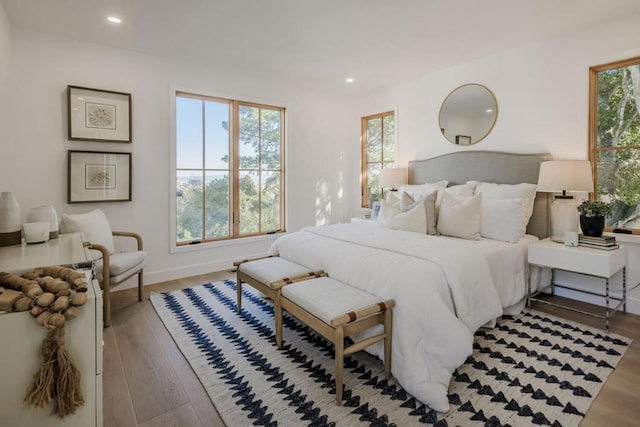 bedroom with light hardwood / wood-style flooring