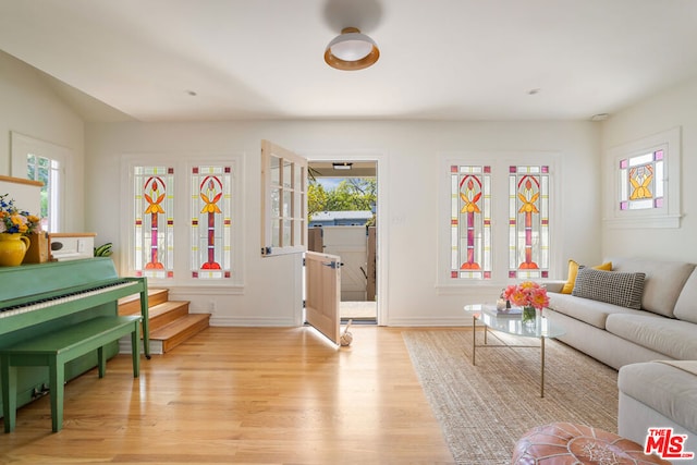 living room with light hardwood / wood-style flooring